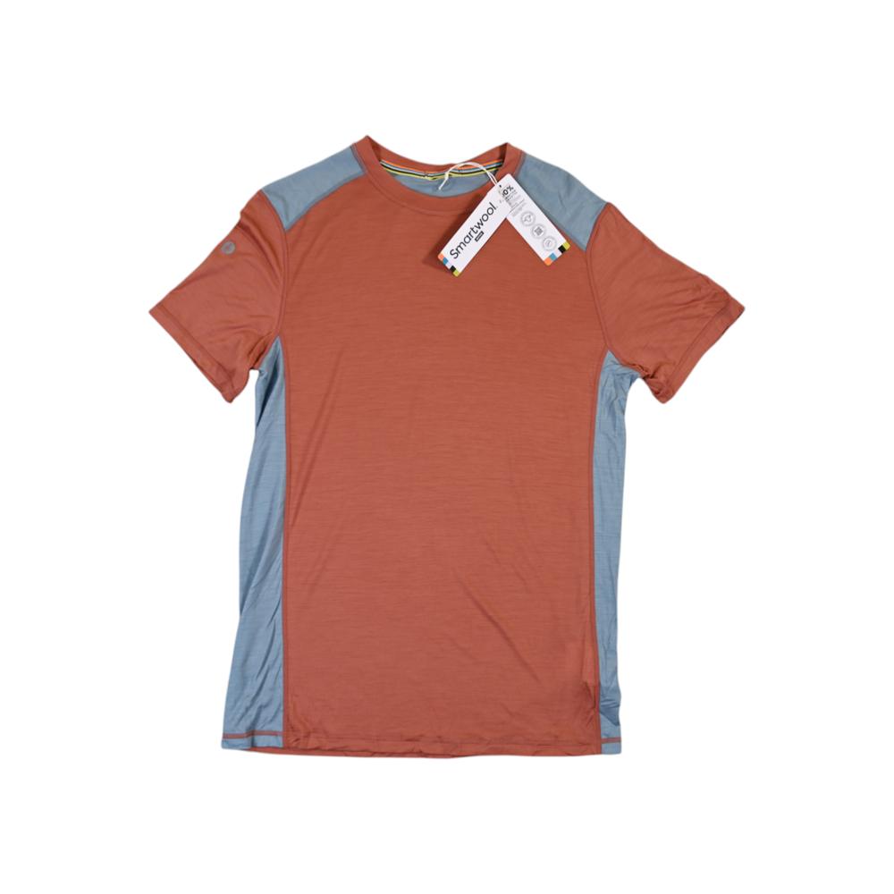 Orange t-shirt by Smartwool with blue trim, displayed on a white background.