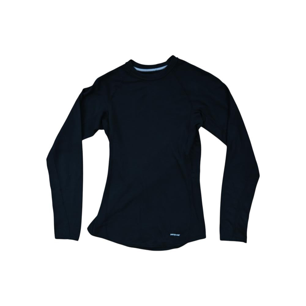 Black long-sleeve base layer shirt by Patagonia with crew neck and slim fit.