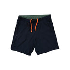 Black active shorts by Roark with orange drawstrings and green interior waistband.