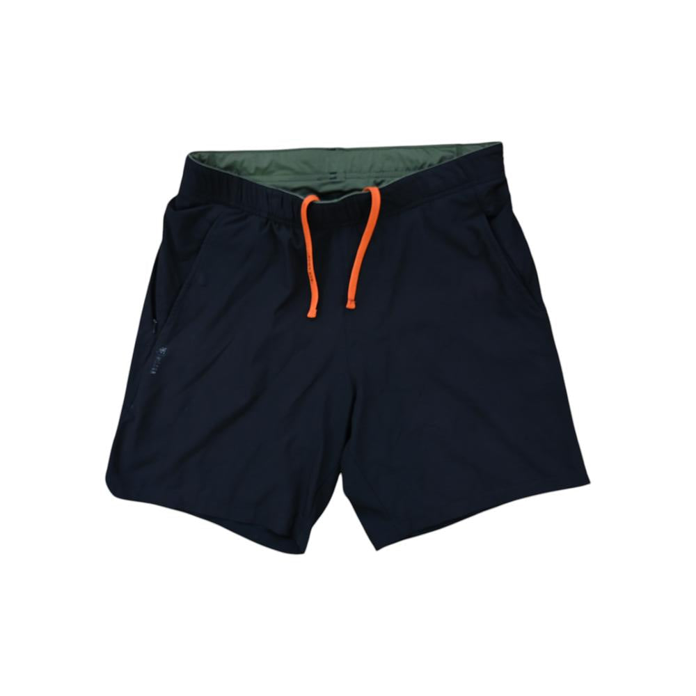 Black active shorts by Roark with orange drawstrings and green interior waistband.