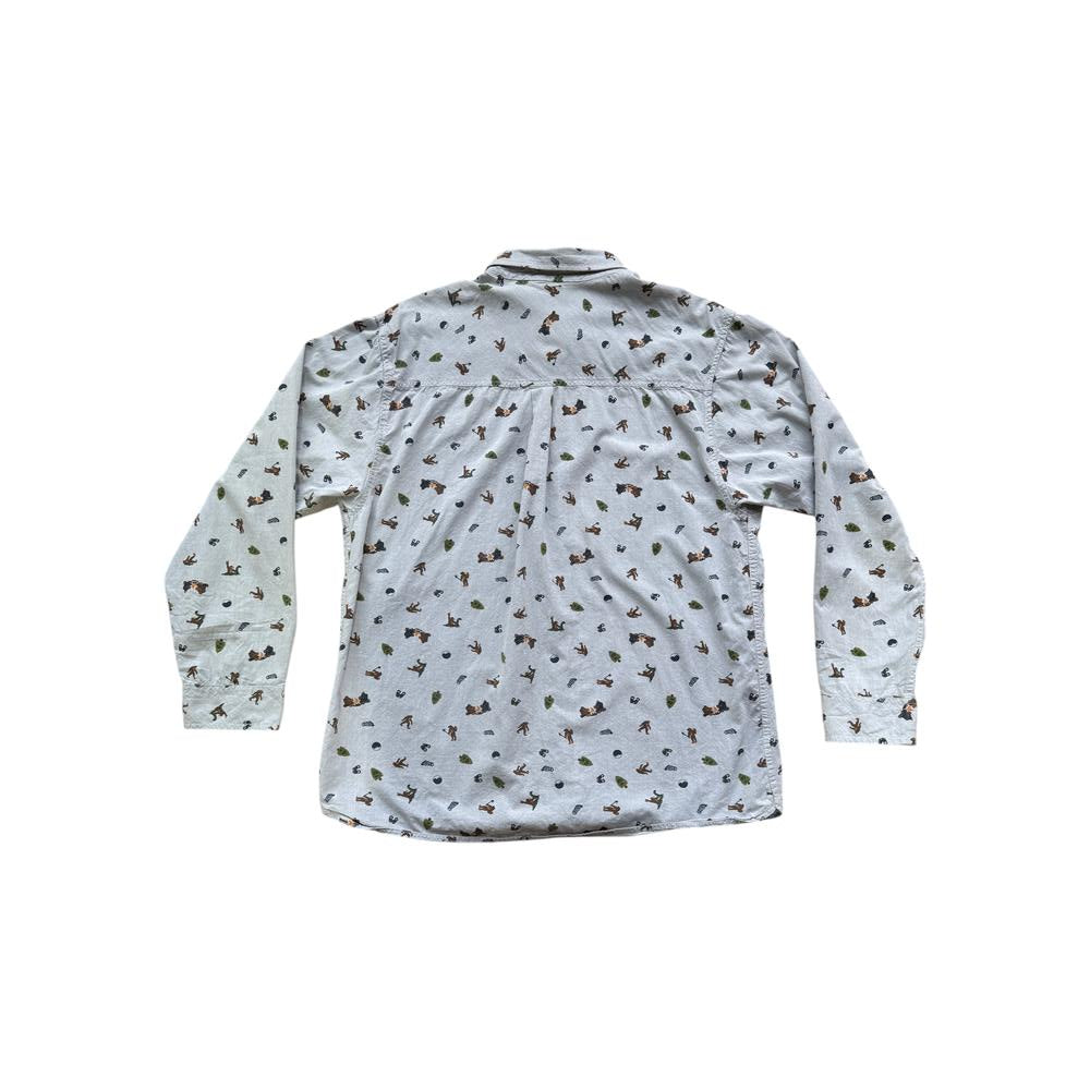 Grey long sleeve button-up shirt by Kavu, featuring an all-over animal and tree print.