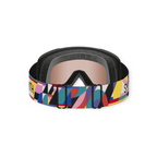 Ski goggles with rose-gold lenses by Smith, featuring a colorful geometric pattern on the strap.